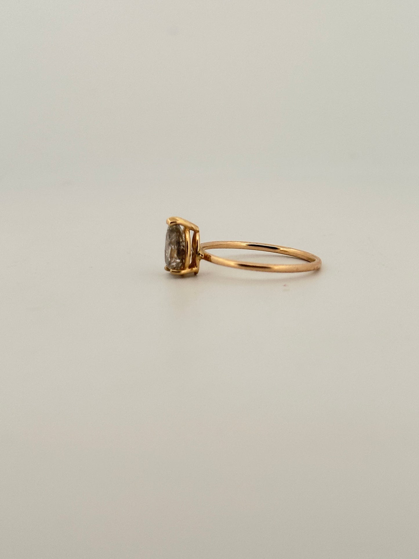 Vintage natural pear shaped diamond solitaire ring in 14k yellow gold