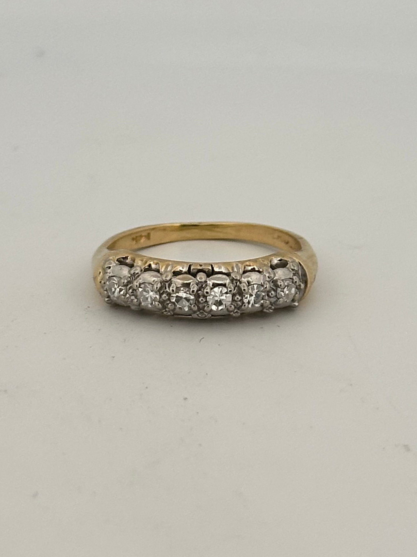Vintage natural diamond half eternity band circa 1950s in 14k gold