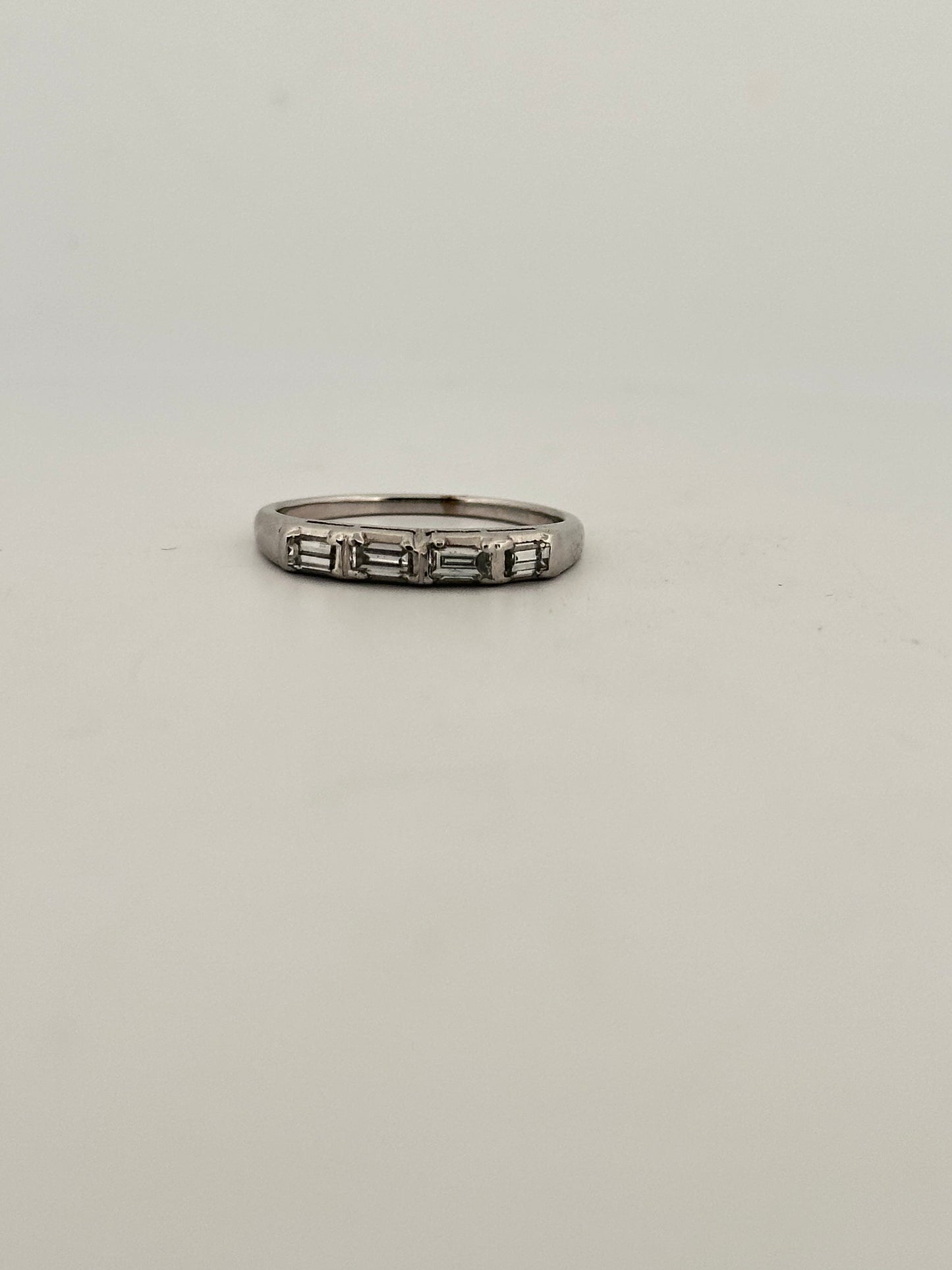 Natural baguette diamond half eternity band in 14k white gold