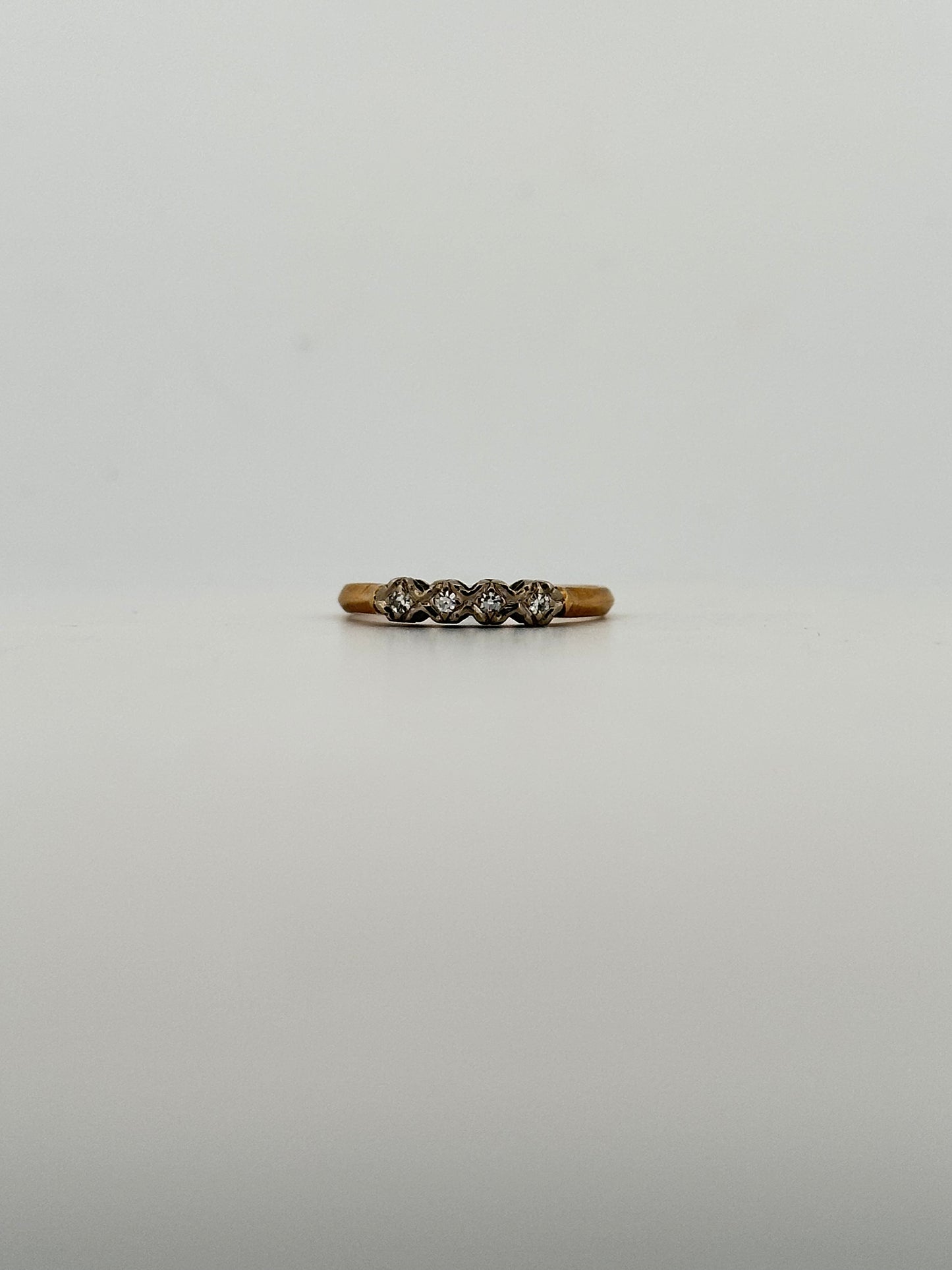 Vintage natural diamond half eternity band in 14k gold circa 1960s