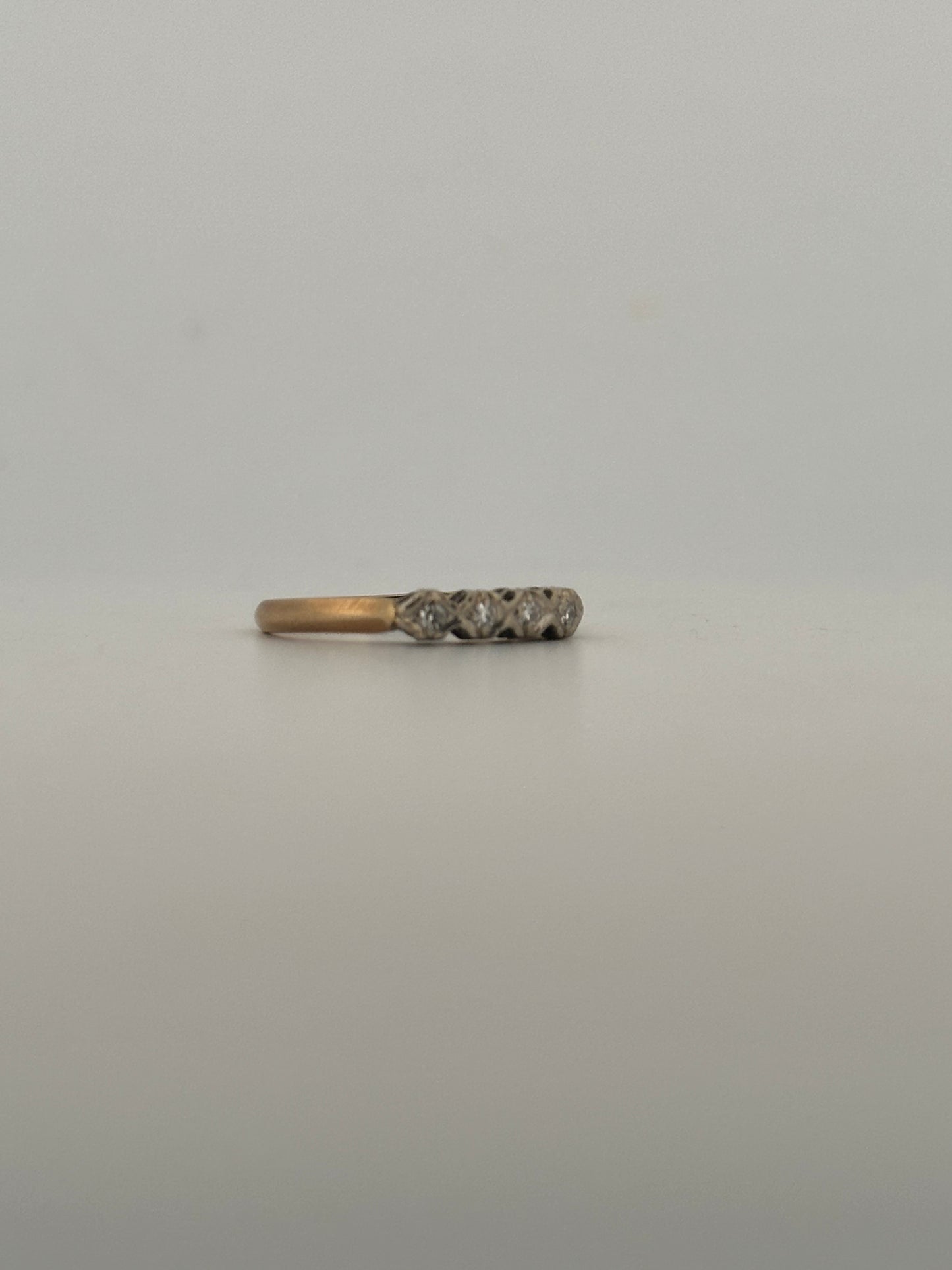 Vintage natural diamond half eternity band in 14k gold circa 1960s