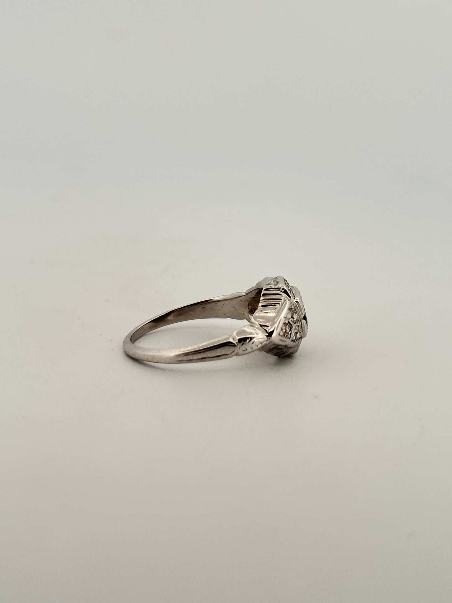 Antique art deco diamond and tanzanite ring in 18k white gold