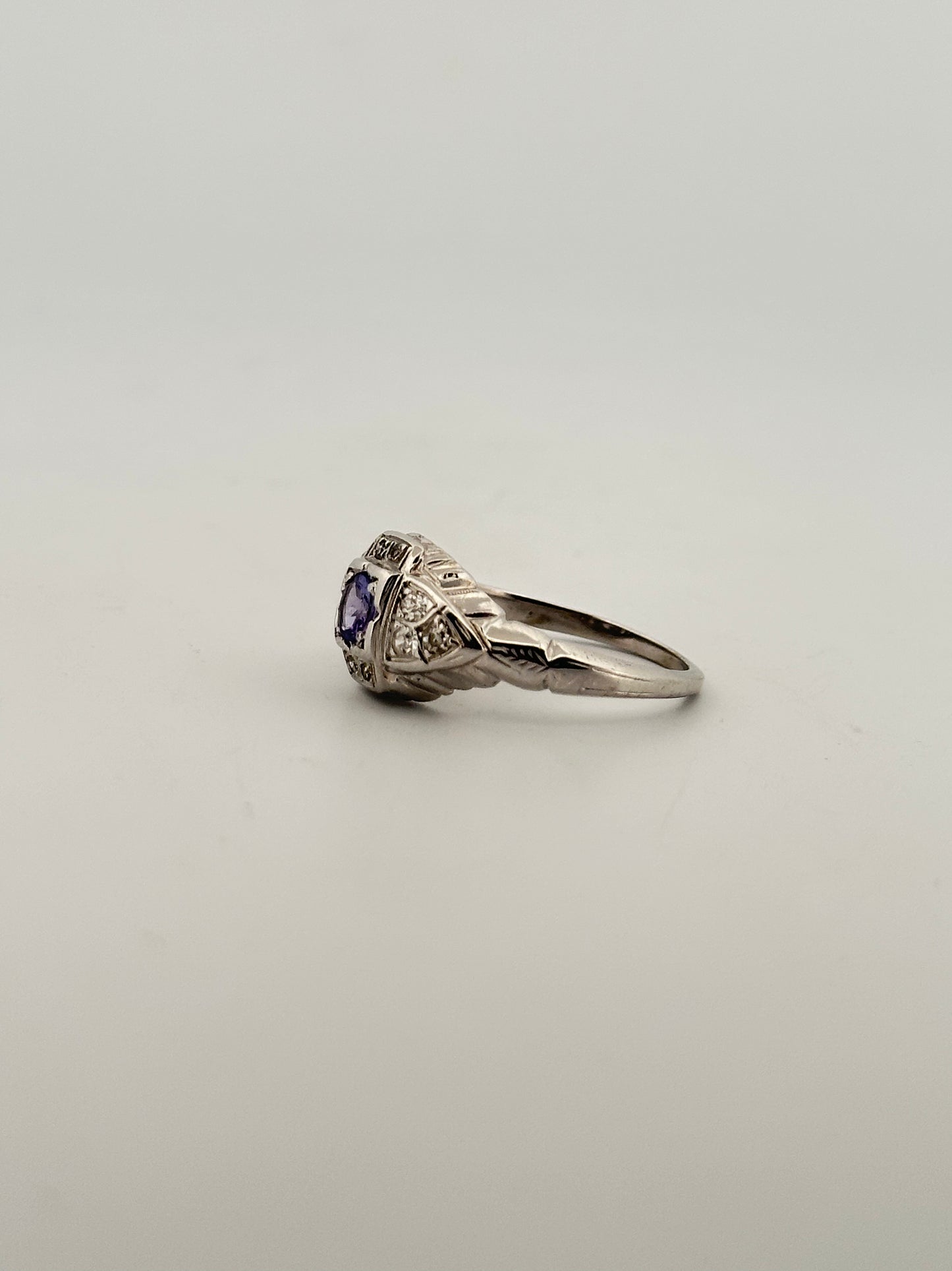 Antique art deco diamond and tanzanite ring in 18k white gold