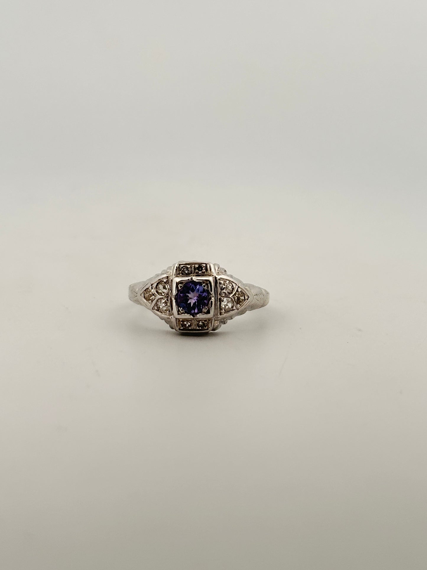 Antique art deco diamond and tanzanite ring in 18k white gold