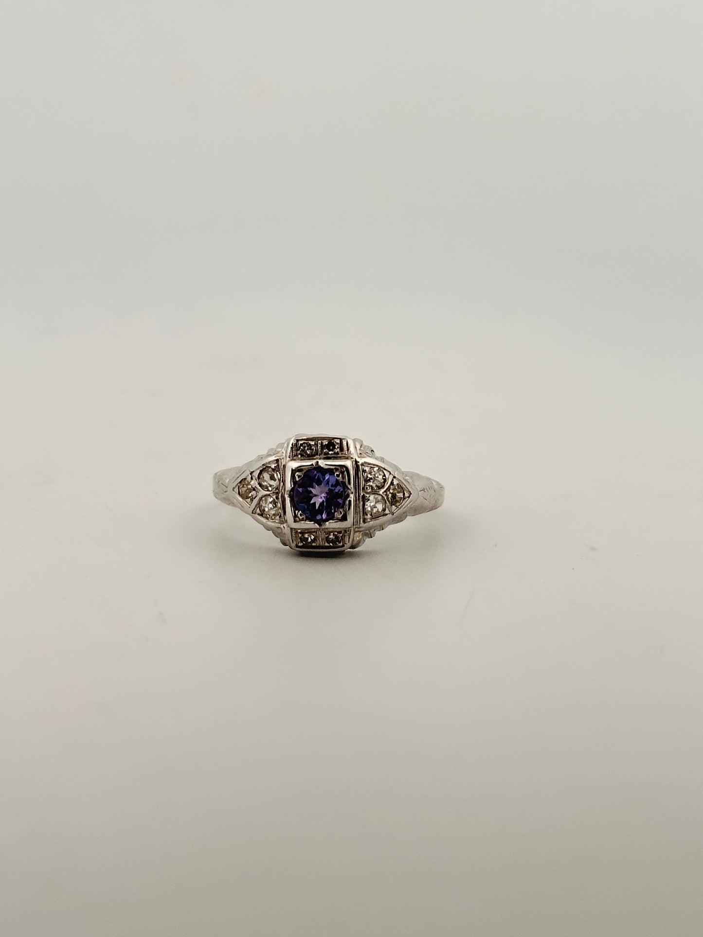 Antique art deco diamond and tanzanite ring in 18k white gold