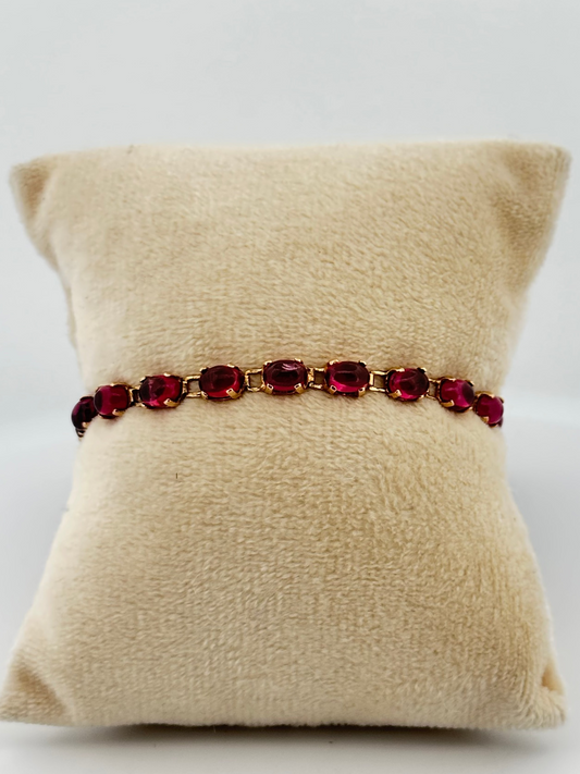 Vintage rhodalite garnet cabochon tennis bracelet in 14k yellow gold