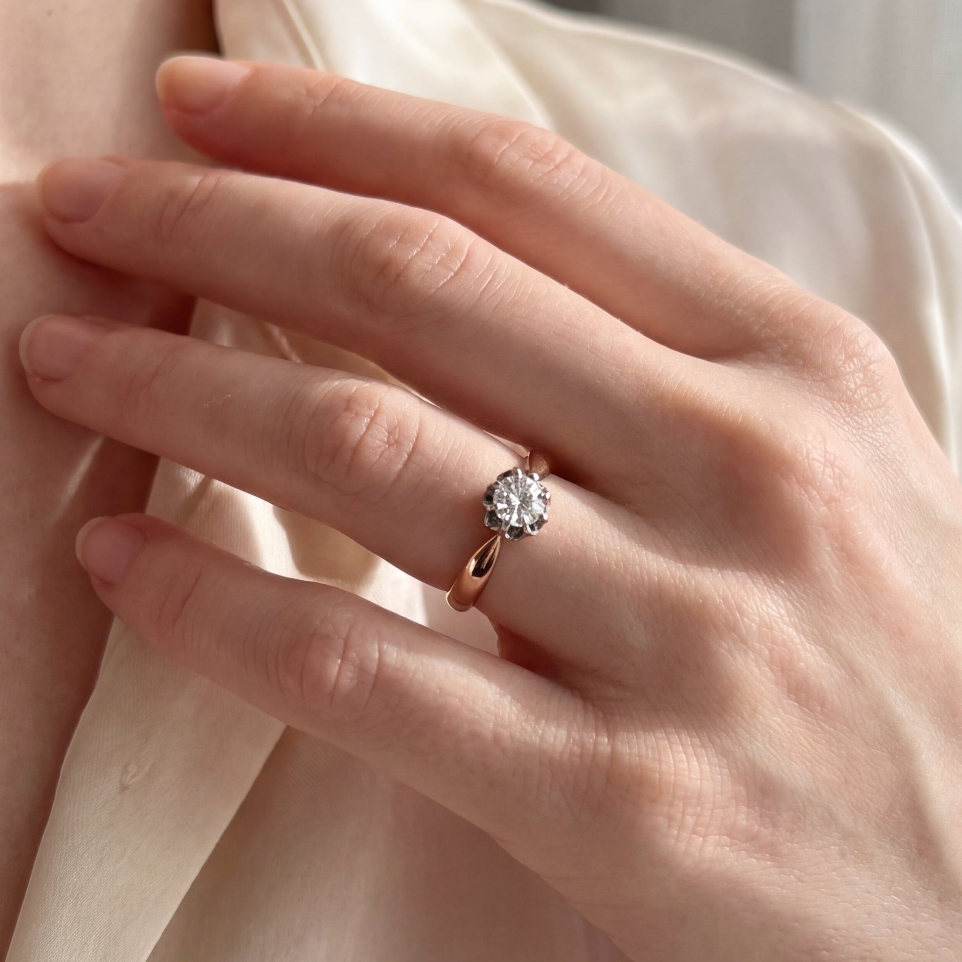 Antique Victorian mine cut diamond solitaire ring in 14k yellow gold with tapered band, featuring intricate vintage design.