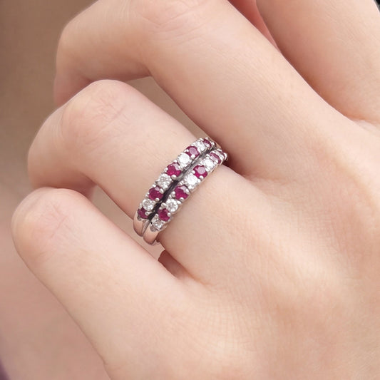 Double row ruby and diamond stacker ring in 18k white gold, featuring vibrant red rubies and sparkling diamonds.